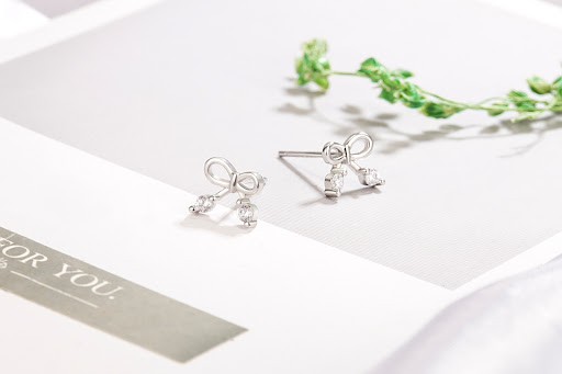 Title 4, Womens Simple Zircon Bow Stud Earrings, a touc...