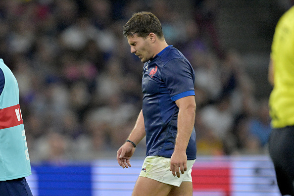 Antoine Dupont of France leaves the field with a jaw injury during the Rugby World Cup match against Namibia at Stade Velodrome on September 21 2023 in Marseille, France.