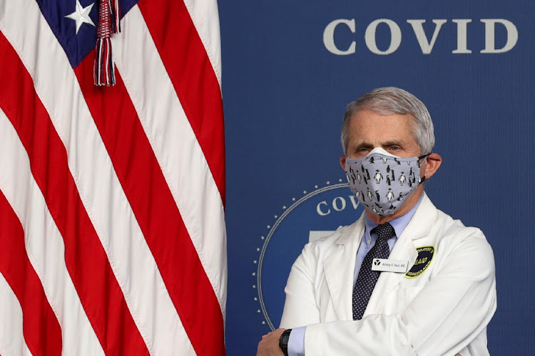 National Institute of Allergy and Infectious Diseases Director Dr. Anthony Fauci stands by during an event to commemorate the 50 millionth Covid-19 vaccination in the South Court Auditorium at the White House in Washington, US, on February 25, 2021.