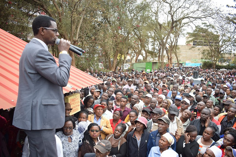 Ruiru MP Simon King'ara addressing residents on Sunday.