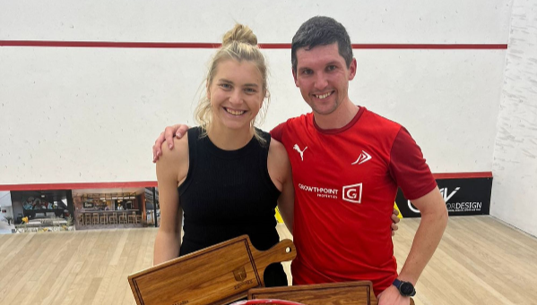 Gqeberha’s Hayley Ward, left, and Pretoria's JP Brits with their women’s and men’s shields after being crowned the Crusaders Squash Club PSA satellite tournament champions on Sunday