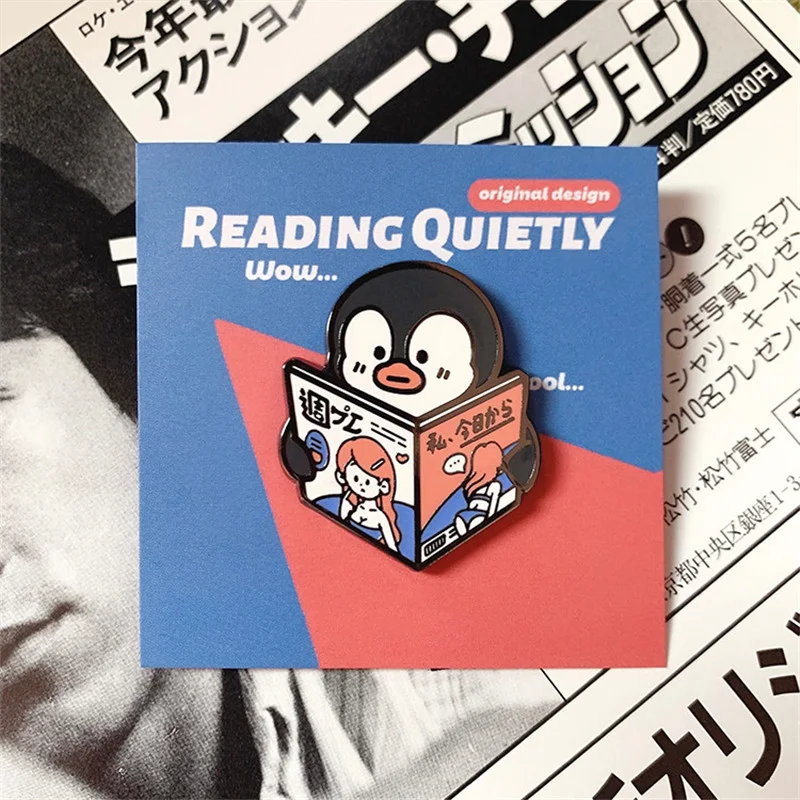 Title 3, Penguin Reading Original Personality badge broc...