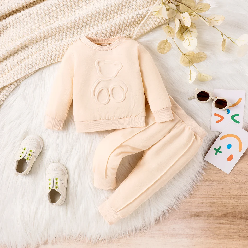 Printed Bear Pullover Sweater and Pleated Trousers Sports Suit for Comfort and Style. Perfect for Everyday Wear and Casu