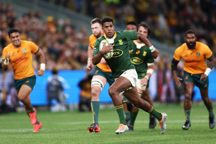 Canan Moodie of the Springboks makes a break to score a try during the Rugby Championship match between the Wallabies and Springboks at Allianz Stadium on September 3 2022 in Sydney, Australia.