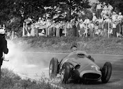 World champion Argentinian racing driver Juan Manuel Fangio in action driving a Maserati at the 1957 Italian Grand Prix at Monza. He finished second behind Stirling Moss in a Vanwall