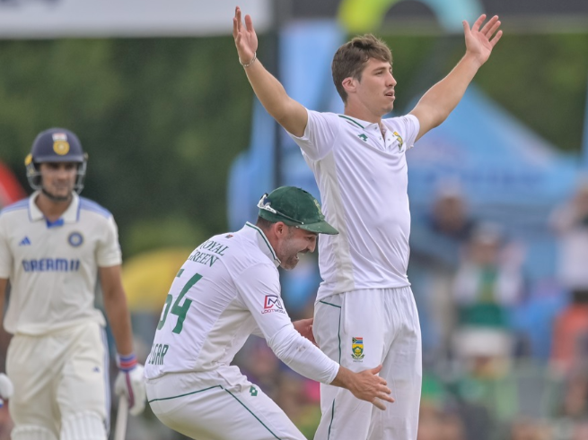 Proteas batter Dean Elgar celebrate with Nandre Burger during day three of the first Test between South Africa and India at SuperSport Park in Centurion.