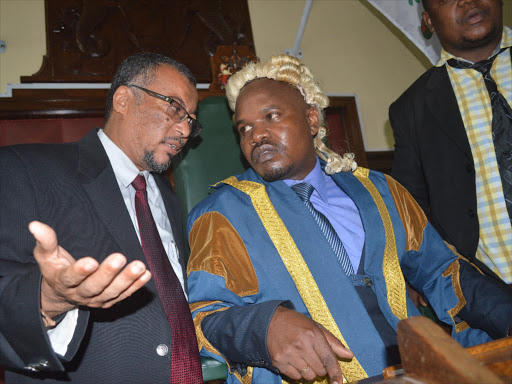 Nominated MCA Mohamed Hatimy chats with Mombasa county speaker Thaddeus Rajwai after scuffle erupted at the assembly on May 11. Photo / John Chesoli