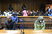 Teboho James Dipholo appears in the Bloemfontein magistrate's court with Dr Nandipha Magudumana  (in a green jacket) on April 13.
