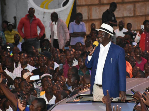 Opposition leader Raila Odinga addressing Kisumu residents in Kondele during a tour on March 16, 2018. /FAITH MATETE