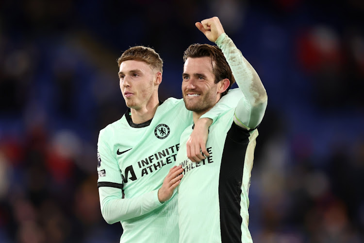 Chelsea players Cole Palmer (left) and Ben Chilwell celebrate victory following the Premier League match against Crystal Palace and Chelsea FC at Selhurst Park on February 12, 2024 in London, England.