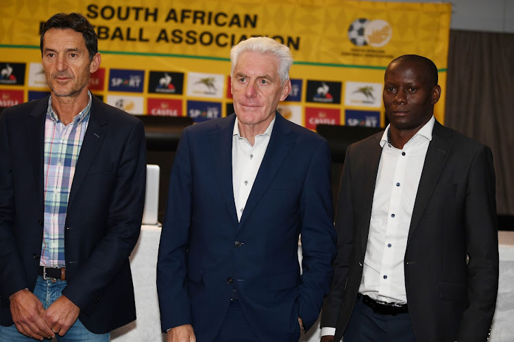 Bafana Bafana coach Hugo Broos (centre) with his assistants Cedomir Janevski (left) and Helman Mkhalele during the South Africa men's national soccer team squad announcement at SAFA House on August 19, 2021 in Johannesburg.