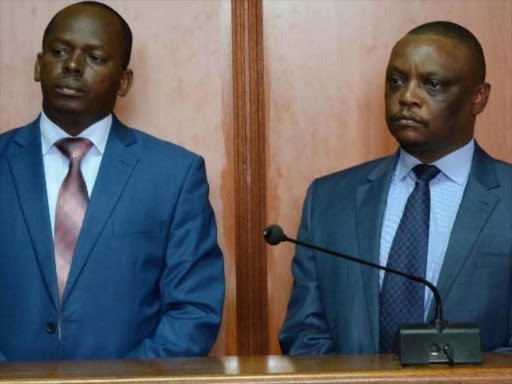 John Maina (Executive Secretary for Lands and Infrastructure) and Martin Wamwea (Executive Secretary for Finance) during a past appearance before the Anti-corruption court in Nyeri /FILE