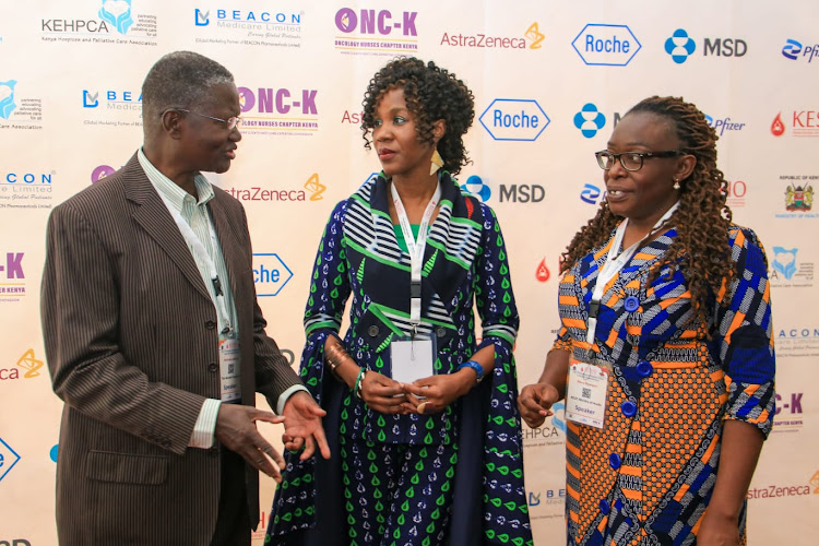 From left: The Kenya Society of Hematology and Oncology (KESHO) founder who is also a consultant oncologist at Nairobi hospital cancer center Nicholas Abinya, The head of national cancer control program at the ministry of health Mary Nyangasi and KESHO chairperson Miriam Mutebi during the Kenya International cancer conference in Mombasa