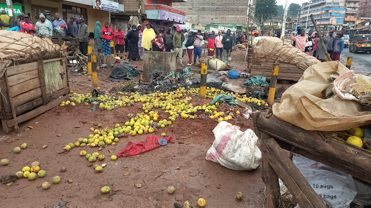 Fruits littered in a street in Keroka after a gang raided Keroka town Wednesday night and set stalls ablaze.
