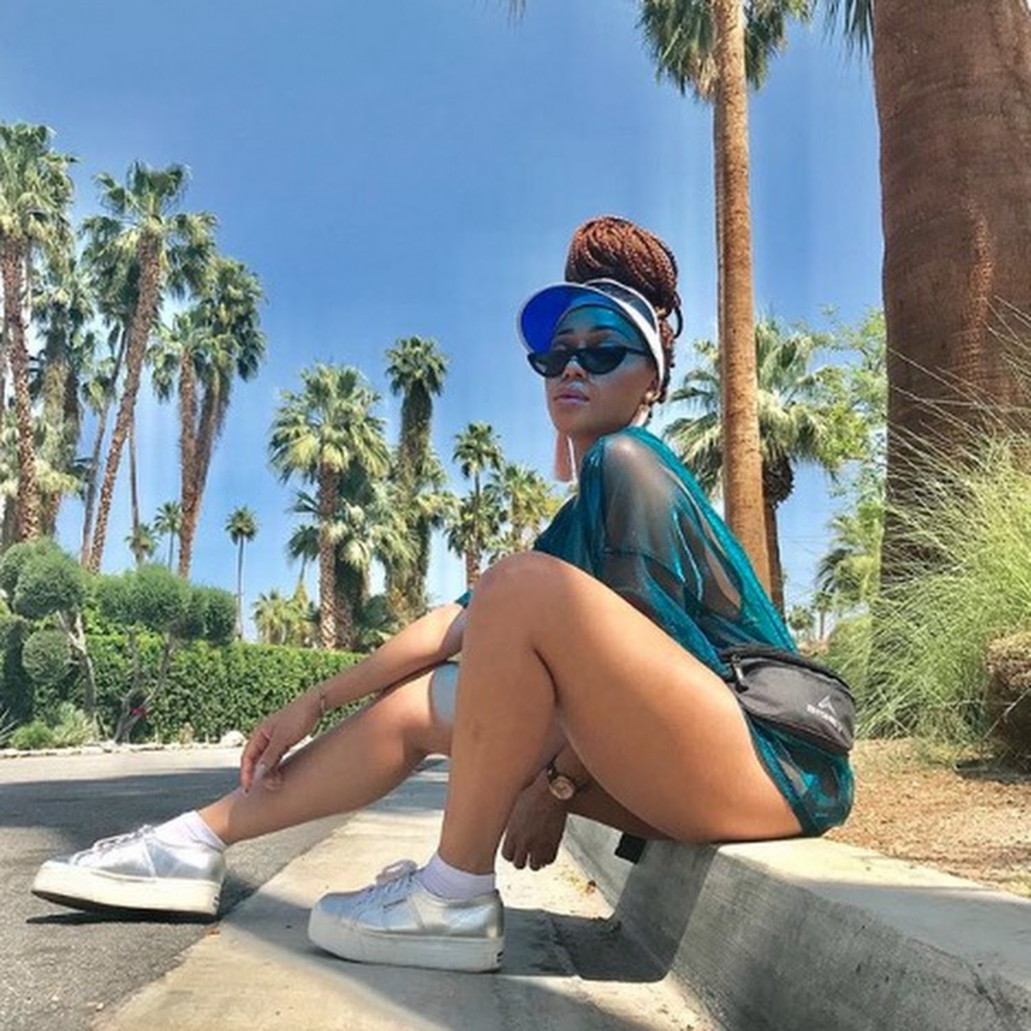 Three snaps of Thando Thabethe that will wish you were living her life