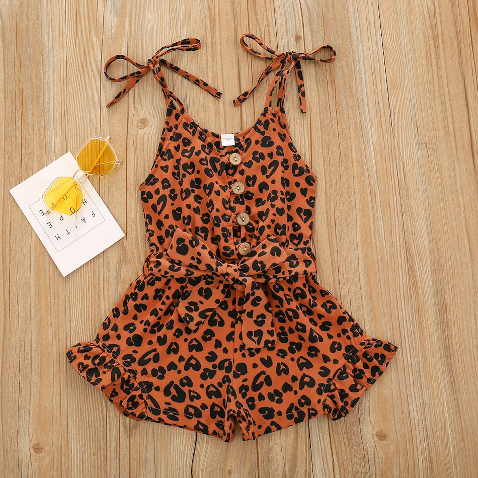 Body à bretelles pour filles avec imprimé cœur, lacets et dentelle, parfait pour un look tendance et confortable. Un incontournable de la mode enfant.