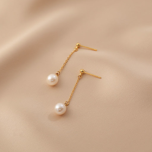 Title 2, Womens long pearl earrings in a new style, all...