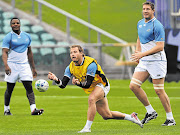 Chiliboy Ralepelle , Francois Hougaard and Bakkies Botha during the Springboks training session at the North Harbour stadium yesterday in Auckland where they play Namibia today Picture: DUIF DU TOIT/GALLO IMAGES