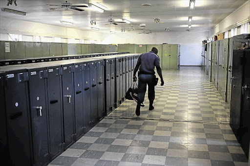 EXPOSED: Safes full of firearms and ammunition - enough for a small army - are not being guarded at the National Intervention Unit base in Pretoria.