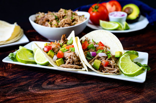 Carnitas (Slow Cooker) in flour tortillas.