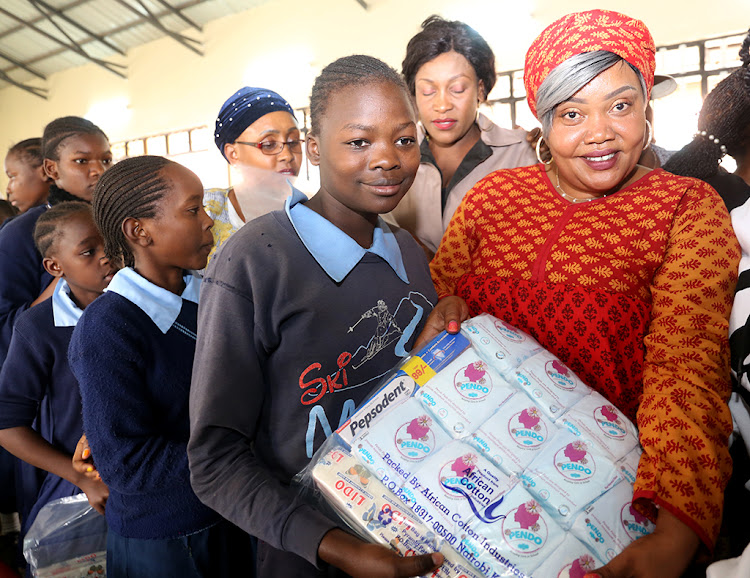 Nairobi county first lady Primrose Mbuvi at Daniel Komboni primary girls in Korogocho where she distributed sanitary towels on May 30, 2019.