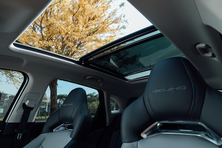 Sporty seats and panoramic roof add premium touches.