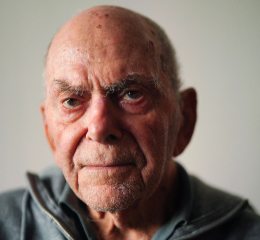 Haim Raanan, 88, a Holocaust survivor who also survived the deadly October 7 Hamas attack on Kibbutz Beeri, sits for a portrait at his temporary accommodation in Tel Aviv. Picture: ALEXANDRE MENEGHINI