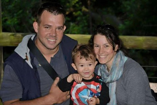 Madre Johnston, 33 – who was eight months pregnant – husband Tony, 34, and son Michael. Picture Supplied.