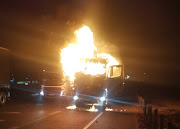 Some of the vehicles that were set on fire during protests on the N3 on Friday night. 