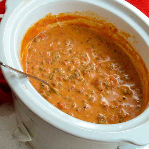 A quick and easy cheesy sausage and tomato dip that can be prepared in a crock pot, on the stovetop, or in the microwave.  