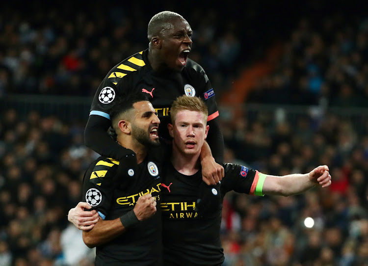 Manchester City's Kevin De Bruyne celebrates scoring their second goal with Riyad Mahrez and Benjamin Mendy.