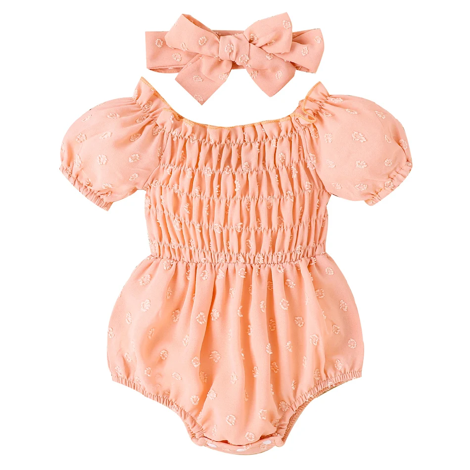 Baby meisje romper met pofmouwen, jumpsuit en strik. Comfortabel en stijlvol voor je kleine meid. Perfect voor de zomer.