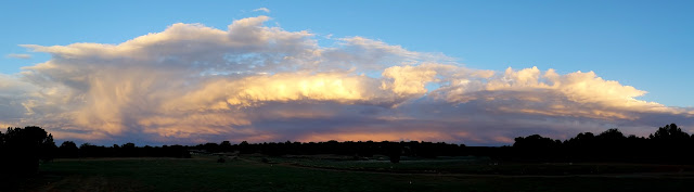 Passing storm clouds at sunset