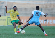 Bafana Bafana's Lyle Lakay is challenged by Norman Mabaya of Botswana during the 2023 Cosafa Cup match in King Zwelithini Stadium on July 8 2023.