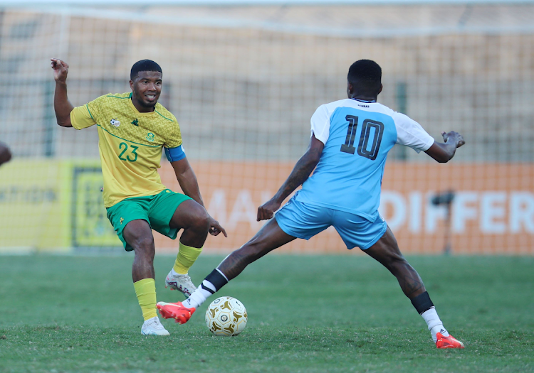 Bafana Bafana's Lyle Lakay is challenged by Norman Mabaya of Botswana during the 2023 Cosafa Cup match in King Zwelithini Stadium on July 8 2023.