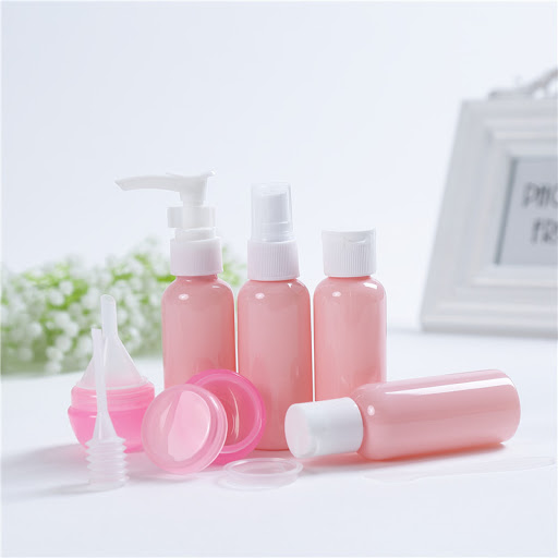 Title 2, Cosmetic Bottling Set including plastic bottles...