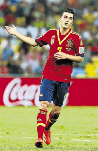 MARKSMAN: Spain's deadly striker David Villa. Photo: Ronald Martinez/Getty Images