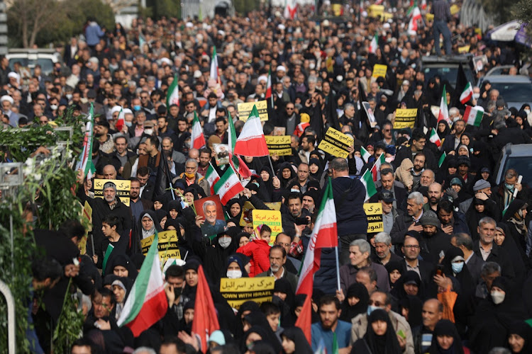 People attend the funeral ceremony of Faezeh Rahimi, one of the casualties of the Islamic State attack in Kerman, after Friday prayers in Tehran, Iran, January 5, 2024. Picture: MAJID ASGARIPOUR/WANA via REUTERS