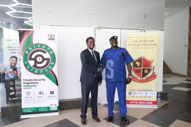 Private Security Regulatory Authority Chief Executive Officer Fazul Mohammed with Nairobi Regional Commander Adamson Bungei in Nairobi on February 8,2024