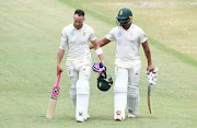 Faf du Plessis and Vernon Philander of the Proteas go to lunch during day three of the first Test between South Africa and Sri Lanka at Kingsmead Stadium on February 15 2019 in Durban, South Africa. 