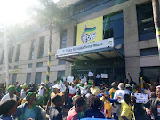 Supporters of eThekwini mayor Zandile Gumede gather outside the KZN ANC headquarters in Durban on Thursday. 
