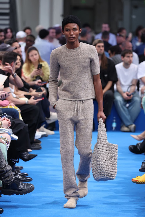 Lebo Malope walks the runway at the JW Anderson Spring/Summer 2024 fashion show in Milan.