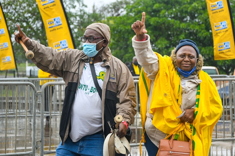 Fans arriving in the rain during the MTN8 final match between Cape Town City and Mamelodi Sundowns at Moses Mabhida Stadium on October 30, 2021 in Durban.