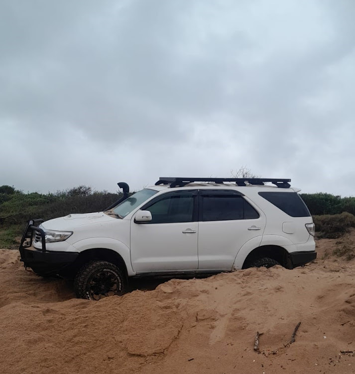 A Toyota Fortuner got stuck in the sand when its owner drove it on an Umdloti beach in the early hours of Wednesday morning.