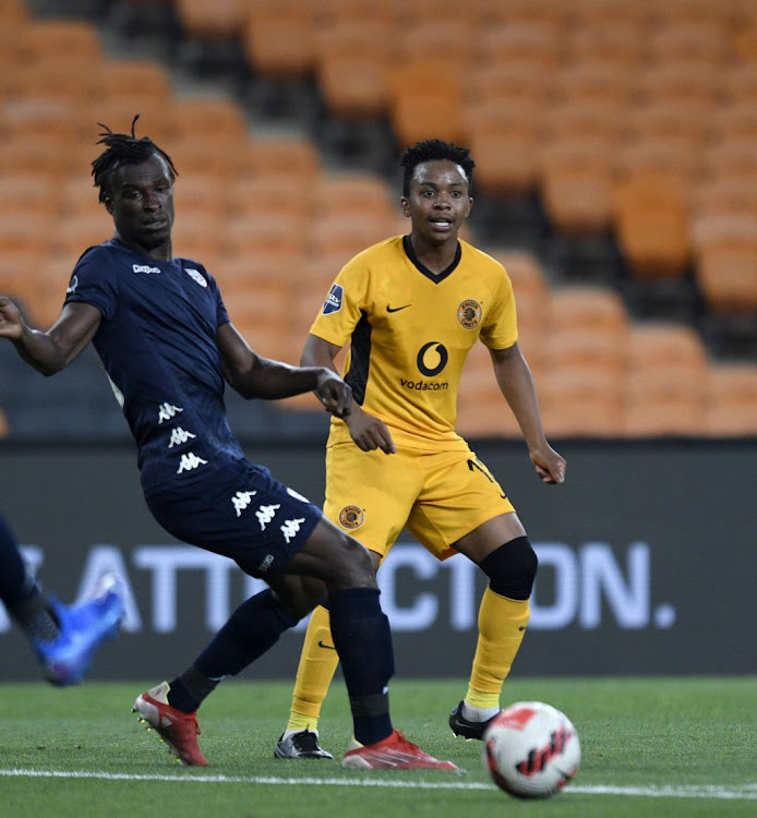 Nkosingiphile Ngcobo of Kaizer Chiefs challenges Edwin Gyimah of Sekhukhune United FC during the DStv Premiership match at FNB Stadium on December 12 2021.