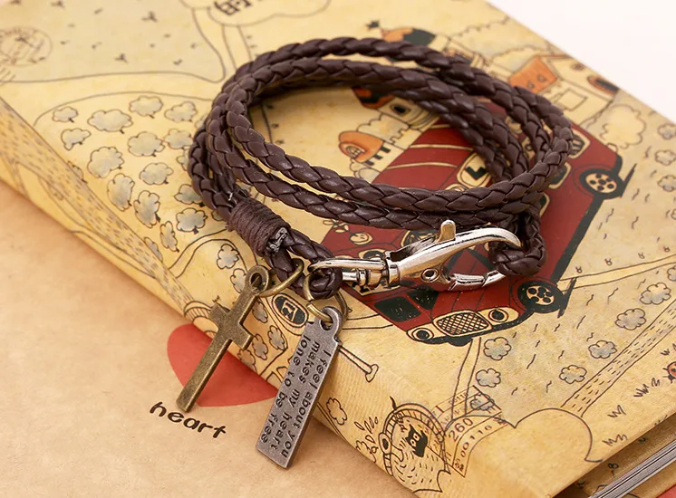 PU Gewebtes Leder Cowhide Armband Doppelring Punk Schmuck, stilvolles Accessoire für einen auffälligen Look.