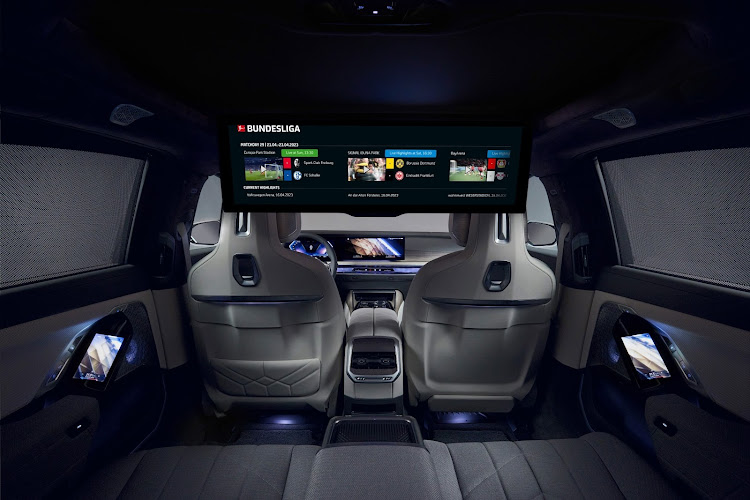 In a partnership with the German Football League, owners of some luxury BMWs can watch exclusive Bundesliga content from the back of their cars. Picture: SUPPLIED