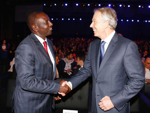 Deputy President William Ruto greets former British PM Tony Blair during theGlobal Education and Skills Conference award ceremony in Dubai on March 14 \CHARLES KIMANI\DPPS