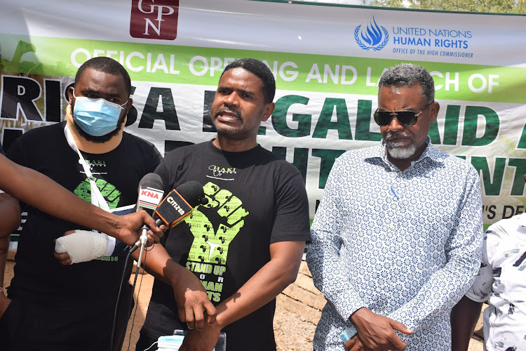 Haki Africa boss Hussein Khalid and DPP Noordin Haji with during the opening of a legal aid office in Garissa. It will help victims of human rights violations.