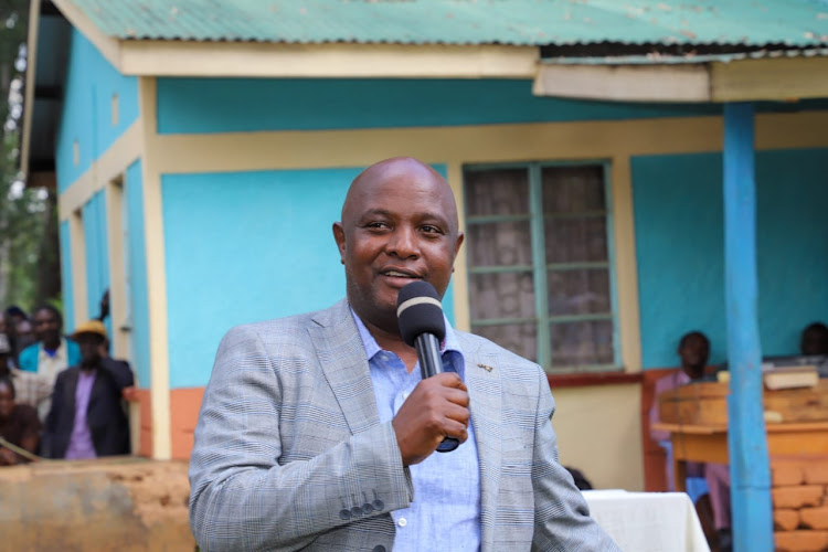 Vihiga Senator Godfrey Osotsi addressing the groud at Ebuyalu secondary school in Emuhaya Sub-county on Friday.